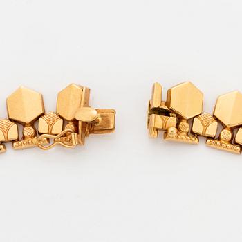 18K gold necklace.
