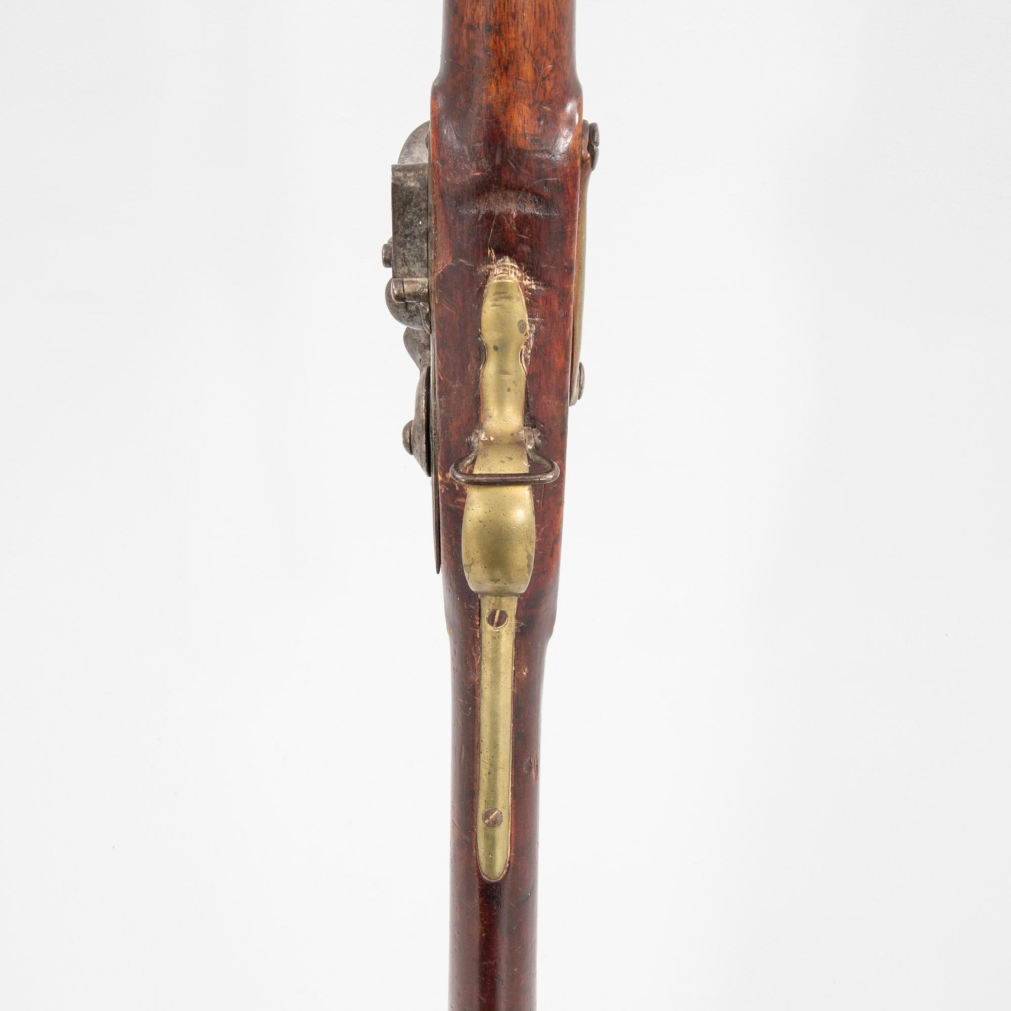 A British Tower and I Salter flintlock musket and bayonet, first half of the 19th century.