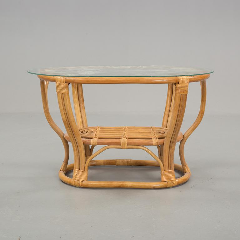 A set of sofa, easy chairs and table in four parts, late 20th century.