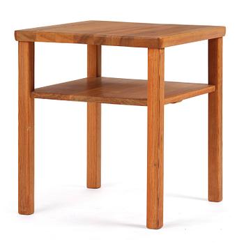 387. Axel Einar Hjorth, a stained pine "Värmdö" table, Nordiska Kompaniet, Sweden, 1930s.