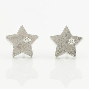 Ole Lynggaard a pair of star-shaped earrings.