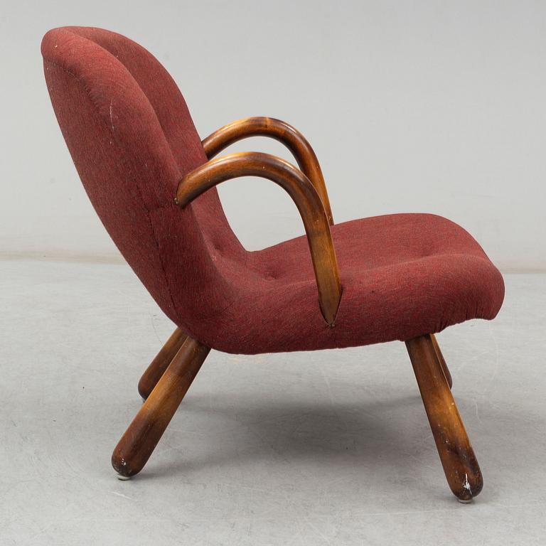 A mid 20th cenutry "Clam Chair" / "Muslinge", attributed to Philip Arctander.