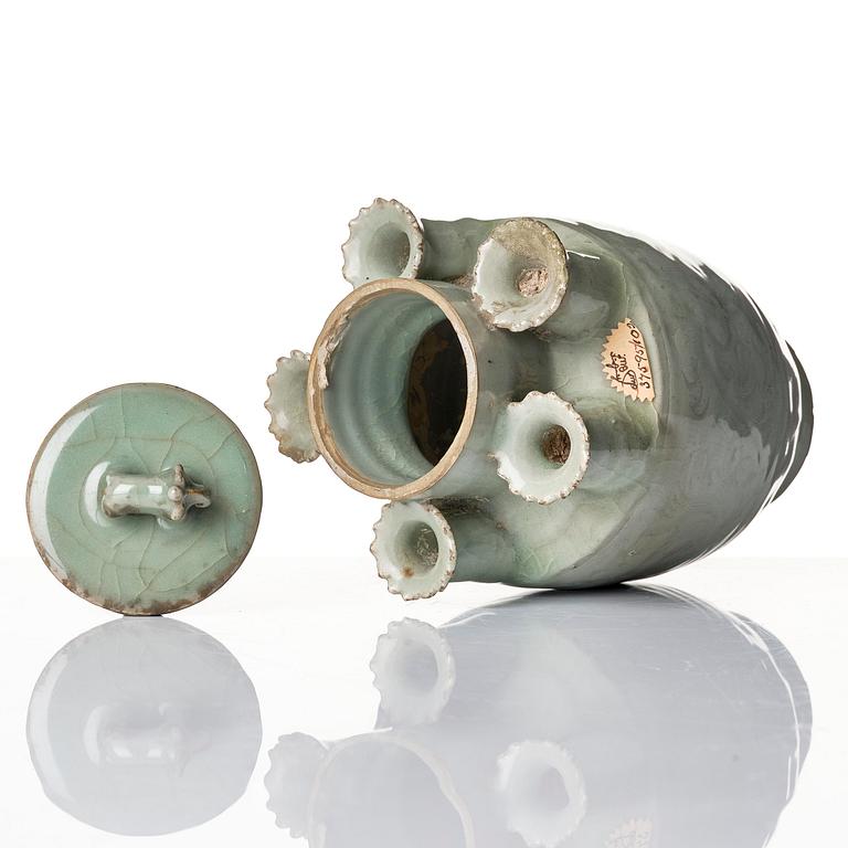 A rare celadon vase with cover and five spouts and cover, Song dynasty (960-1279).