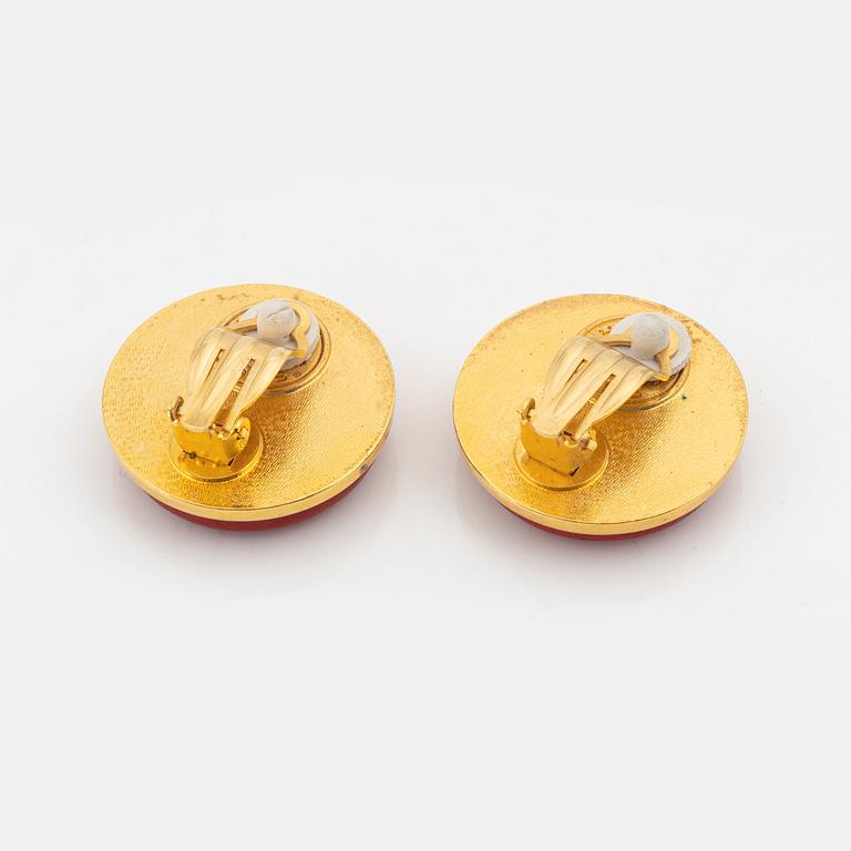 Hermès, a pair of gold tone metal and leather clip-on earrings.