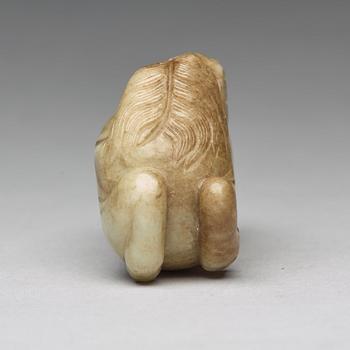 A carved nephrite figure, Ming dynasty (1368-1644).