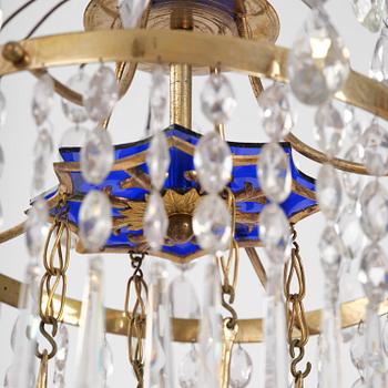 A late-Gustavian five-light gilt brass and cut glass chandelier, Stockholm, late 18th century.