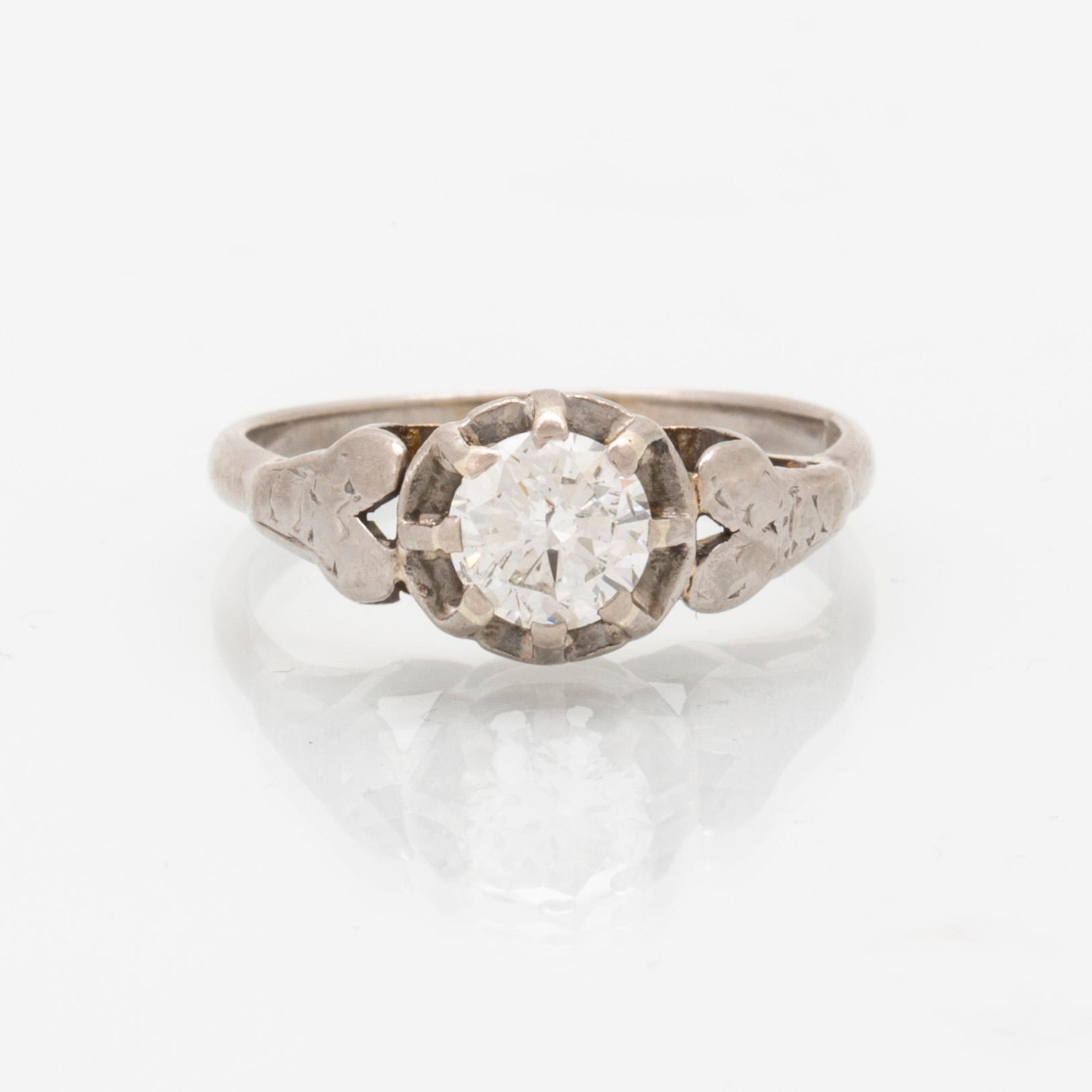 Ring, solitaire, 18K vitguld, 1 briljantslipad diamant ca 0,50 ct, Inclusions, storlek ca 16,25/51.