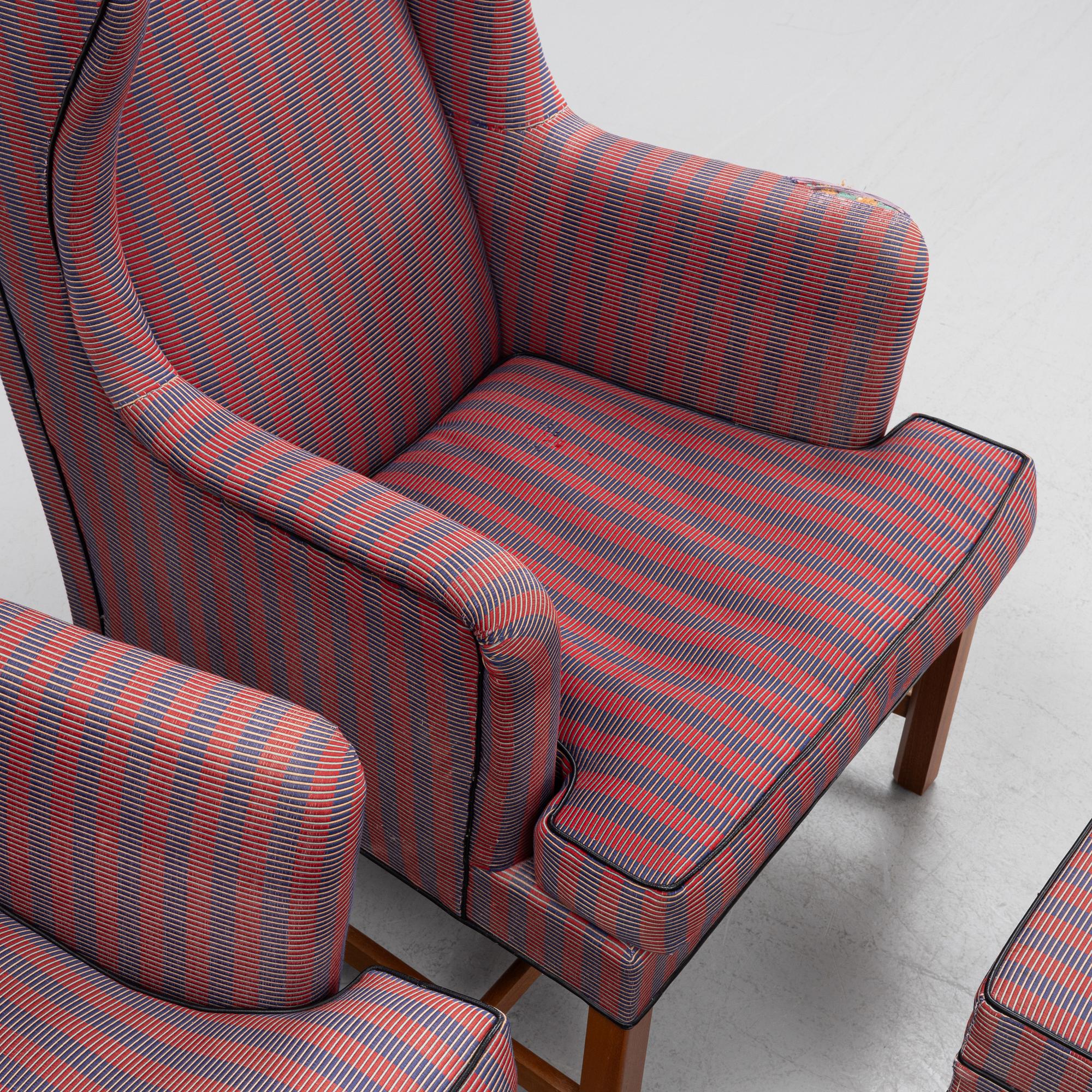 Kaare Klint, a pair of model 6212 armchairs with ottomans, Rud Rasmussen, Denmark.