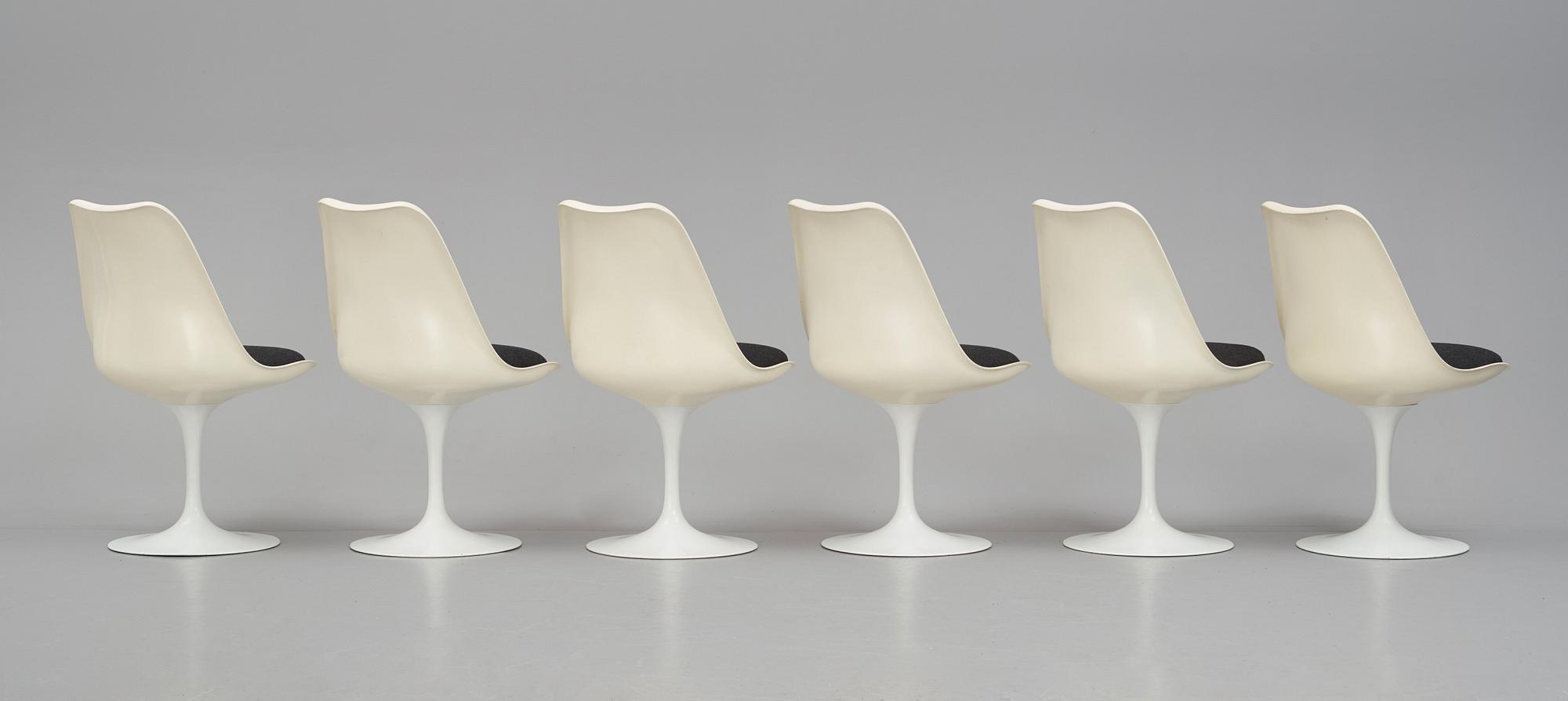 Eero Saarinen, a "Tulip", dining table and 6 chairs, Knoll International, 1960-70's.