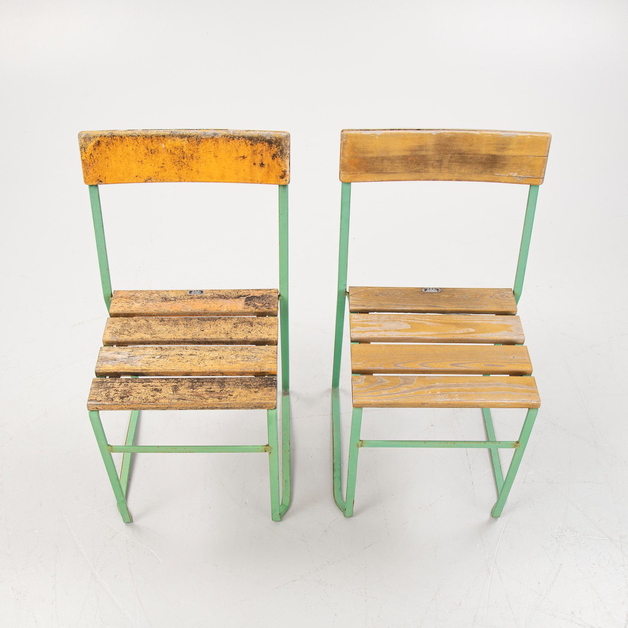 A pair of garden chairs, a version of modell 6, Grythyttan, Sweden, mid 20th century.