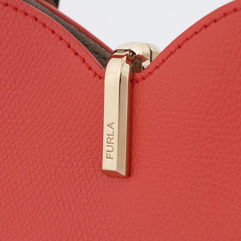 Furla, a red leather handbag.