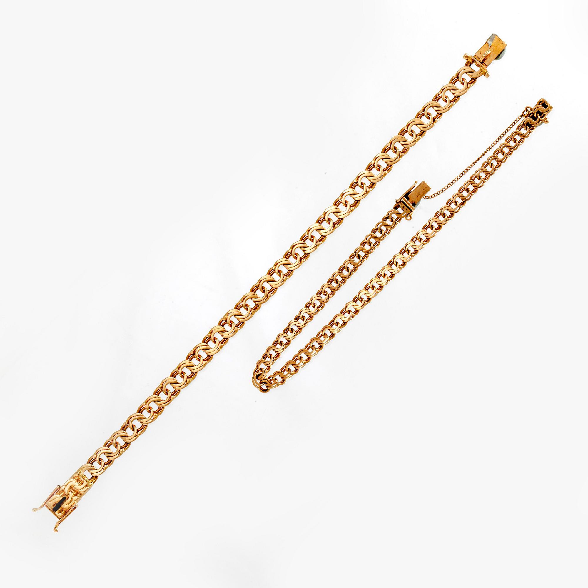 Armlänkar, 2 st. 18K guld, bismarck.