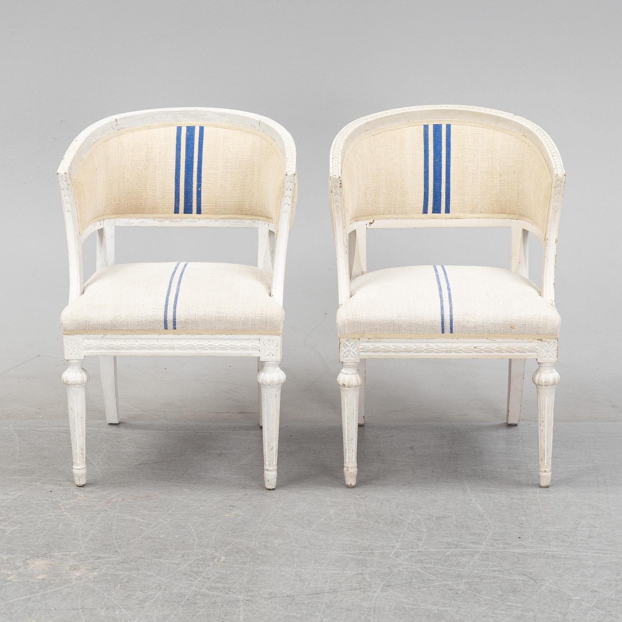 A pair of Gustavian style armchairs from around year 1900.