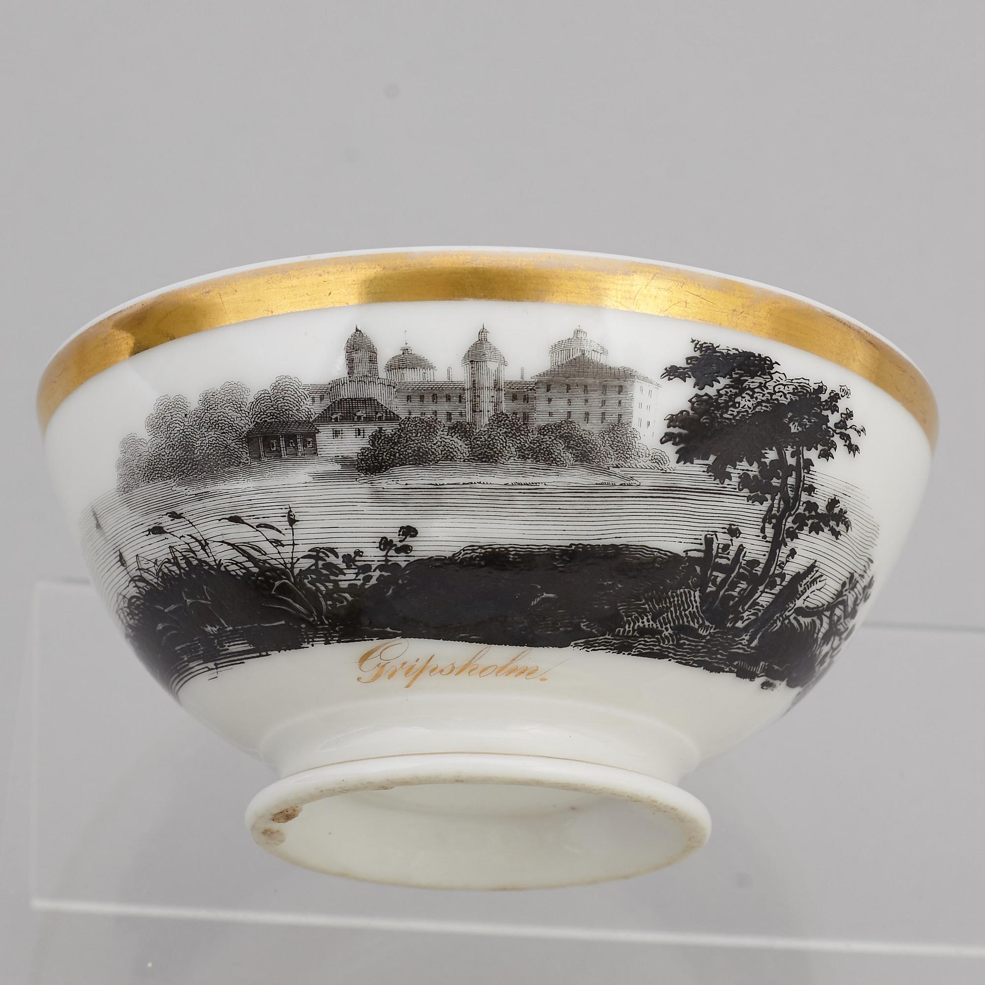 A group of seven cups, one with dish, Germany and France, 19th century.