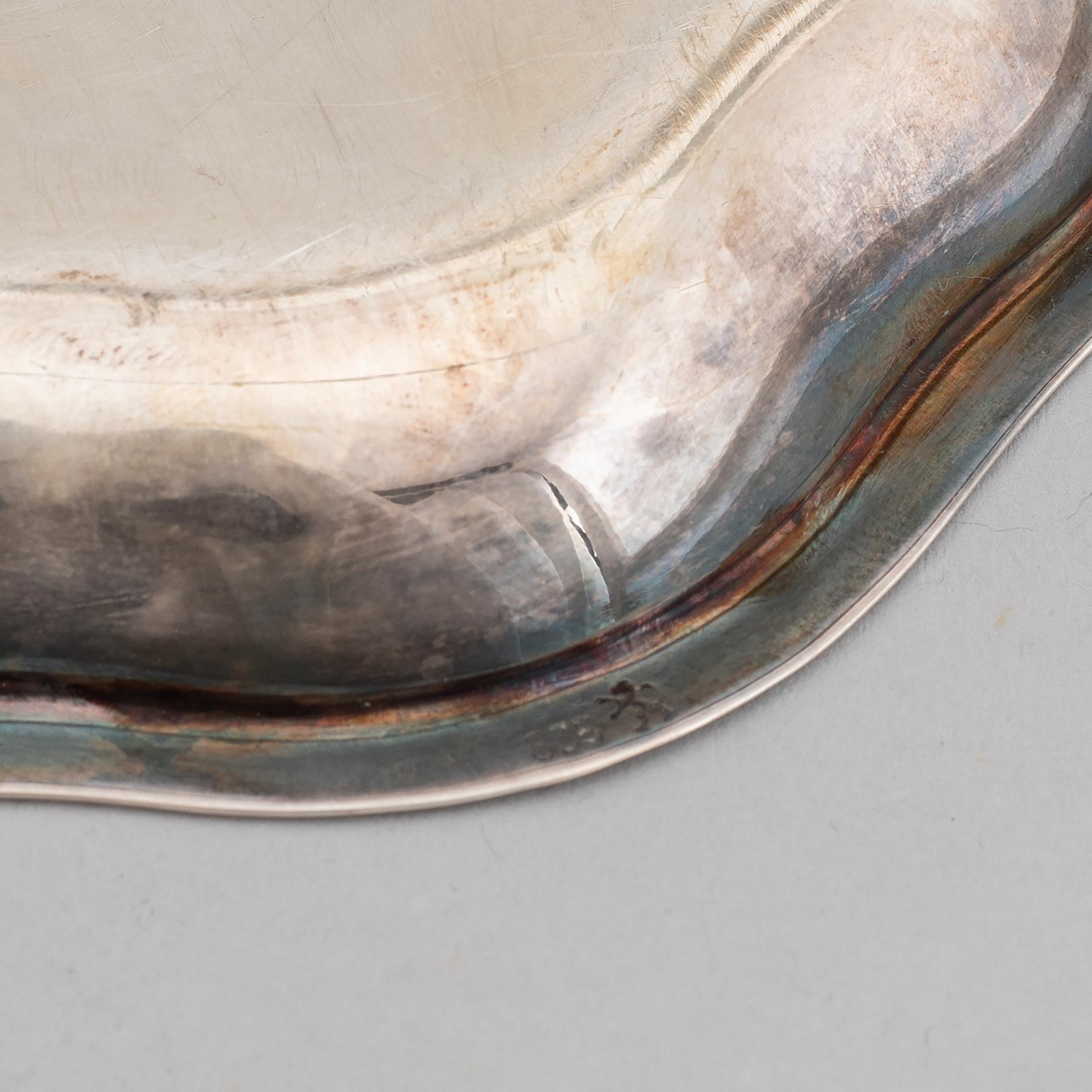 A silver coffee pot, creamer, sugar bowl and tray, swedish import mark.