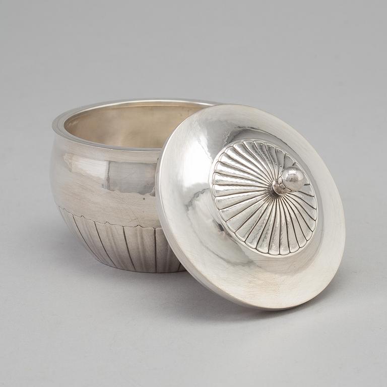 A three piece sterling silver coffee service "Cosmos" design Johan Rohde for Georg Jensen, Copenhage.