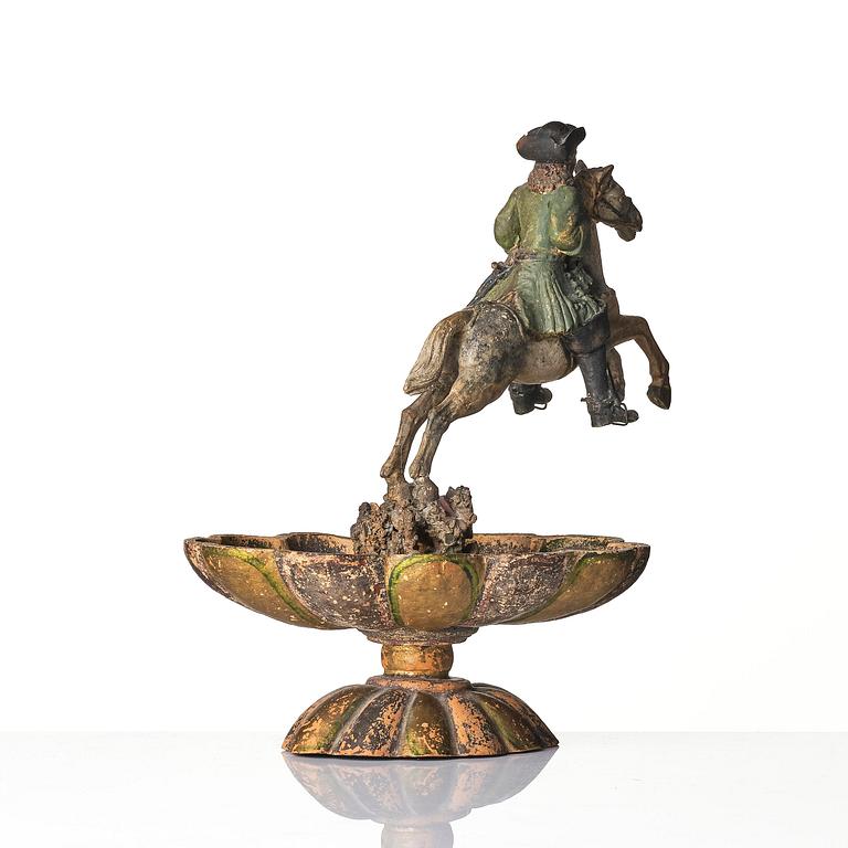 A pottered figure of a solider and horse, presumably late 17th century.