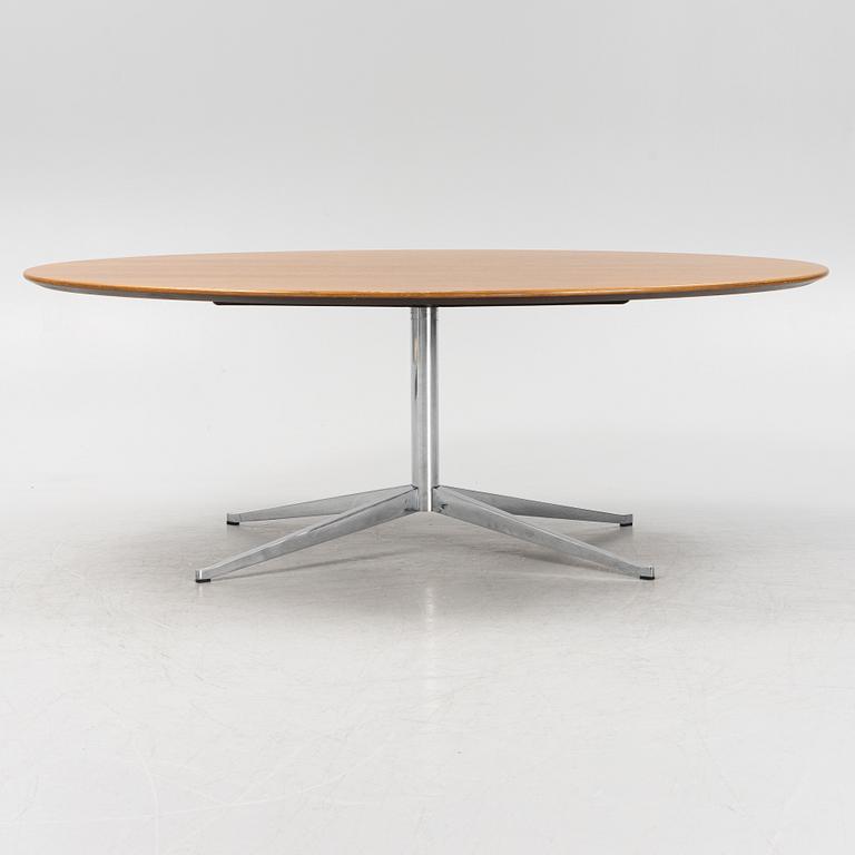 An 'Oval 96' table by Florence Knoll for Knoll International.