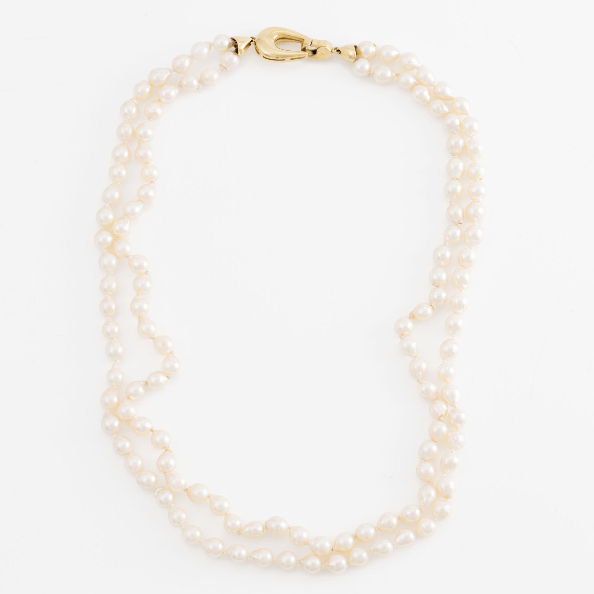 Necklace two rows of cultured pearls clasp 18K gold.