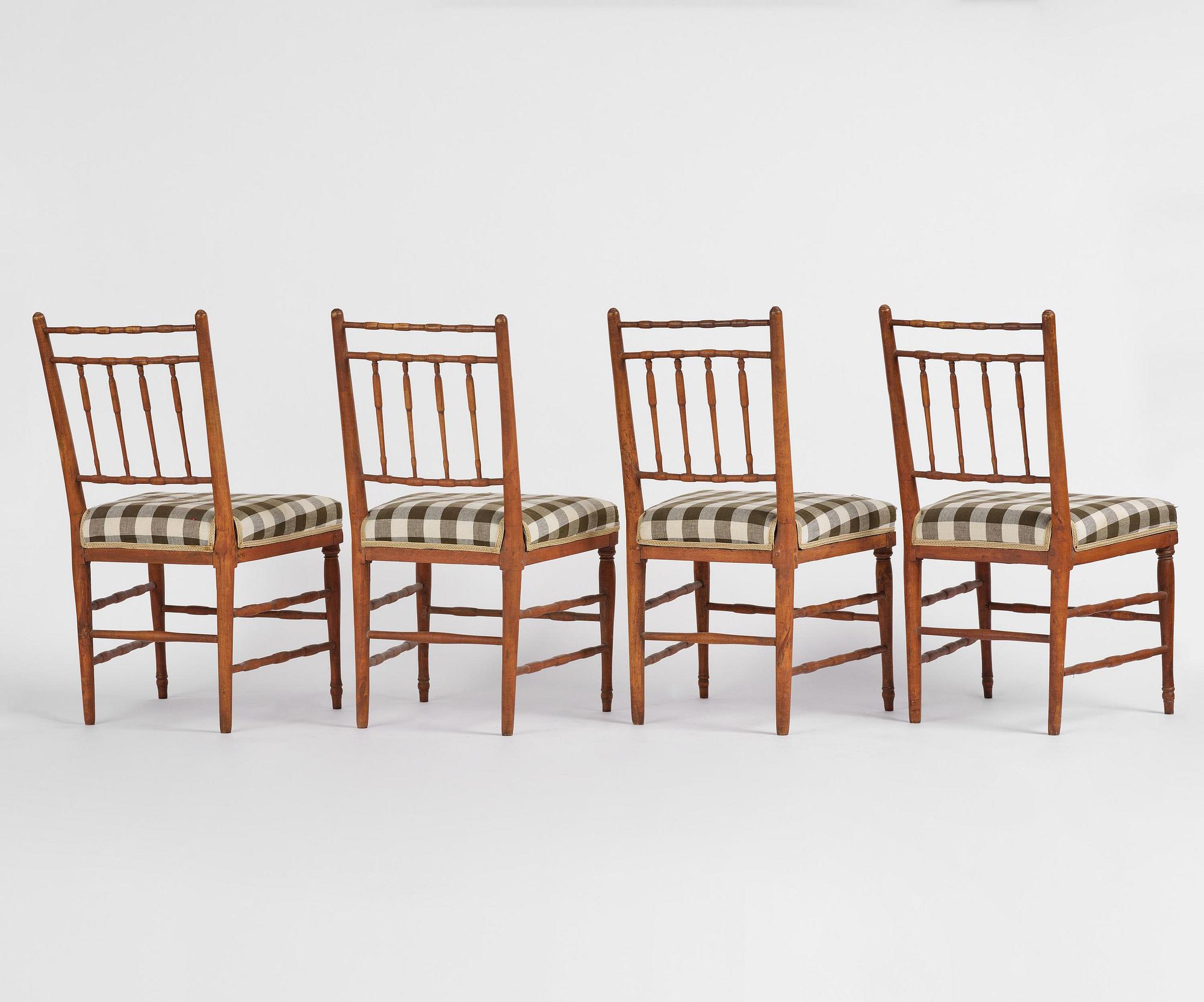 A set of four late Gustavian faux bamboo chairs by J. E. Höglander (master in Stockholm 1777-1813).