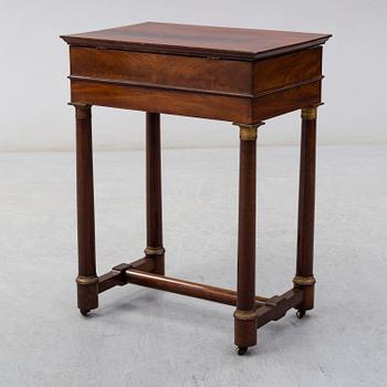 A mid 19th century sewing table.