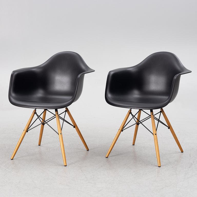 Charles & Ray Eames, a pair of "DAW" plastic chairs, Vitra, Italy, 2015.