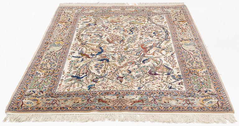 A carpet, semi-antique Esfahan, part silk, signed Eshan doust, ca226,5 x 126 cm.