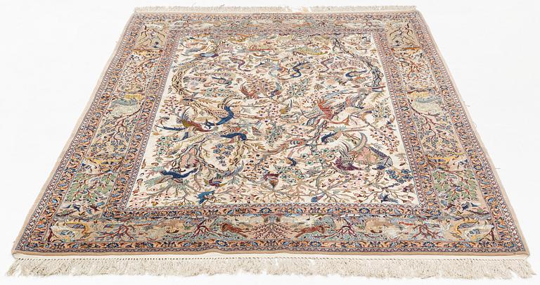 A carpet, semi-antique Esfahan, part silk, signed Eshan doust, ca226,5 x 126 cm.