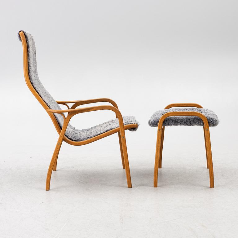 Yngve Ekström, a 'Lamino' armchair with ottoman, Swedese, Sweden, 2020's.