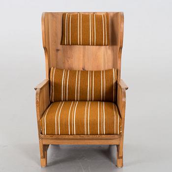 Axel Einar Hjorth, a "Lovö" stained pine armchair, Nordiska Kompaniet, Sweden, 1930's.