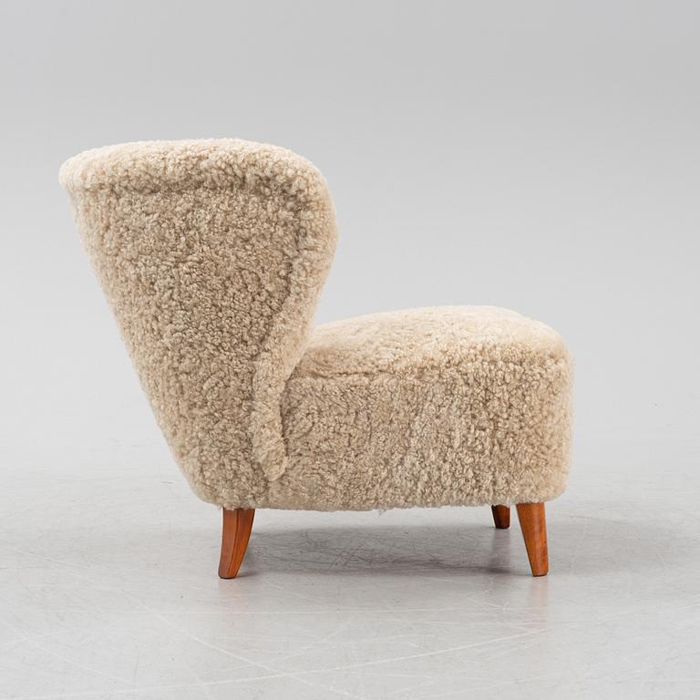 A Swedish Modern easy chair, 1940's/50's, the model has been sold via Gösta Jonsson.