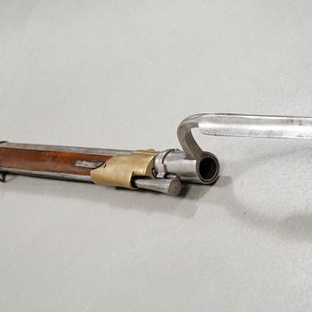 A percussion rifle with bayonet, probably swedish model 1815-45.