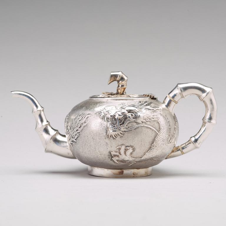 A Chinese four piece silver tea set, Luen Wo, Shanghai, 1875-1925.