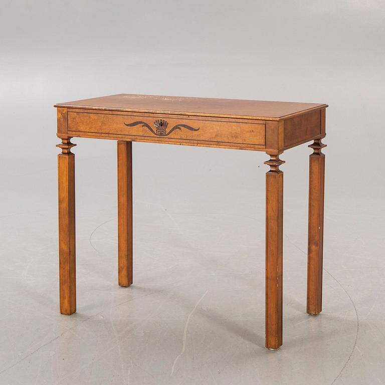 A 1930s birch table.