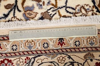 A CARPET, Nain, part silk, around 340 x 241 cm.