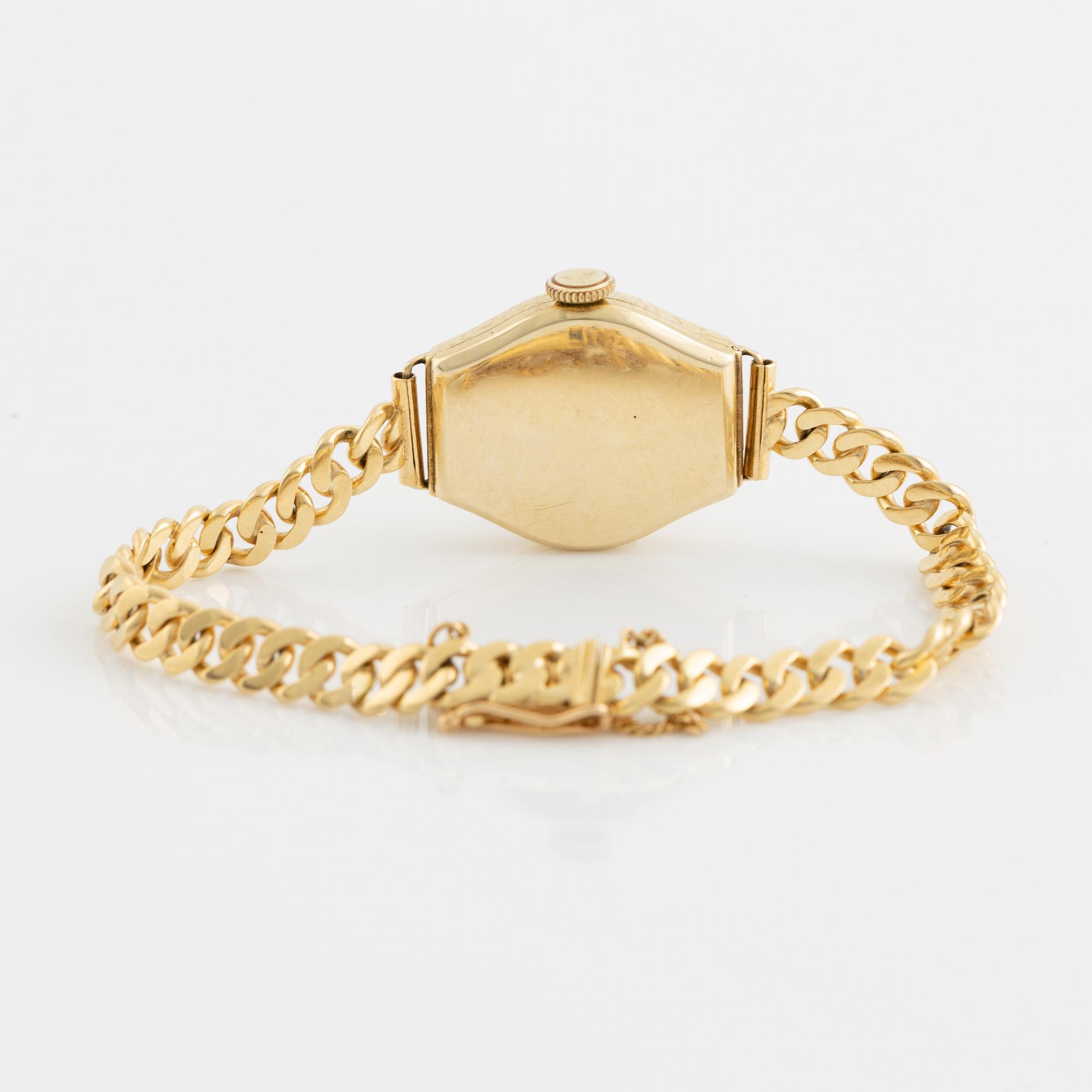 Svalan gold ladiews watch.