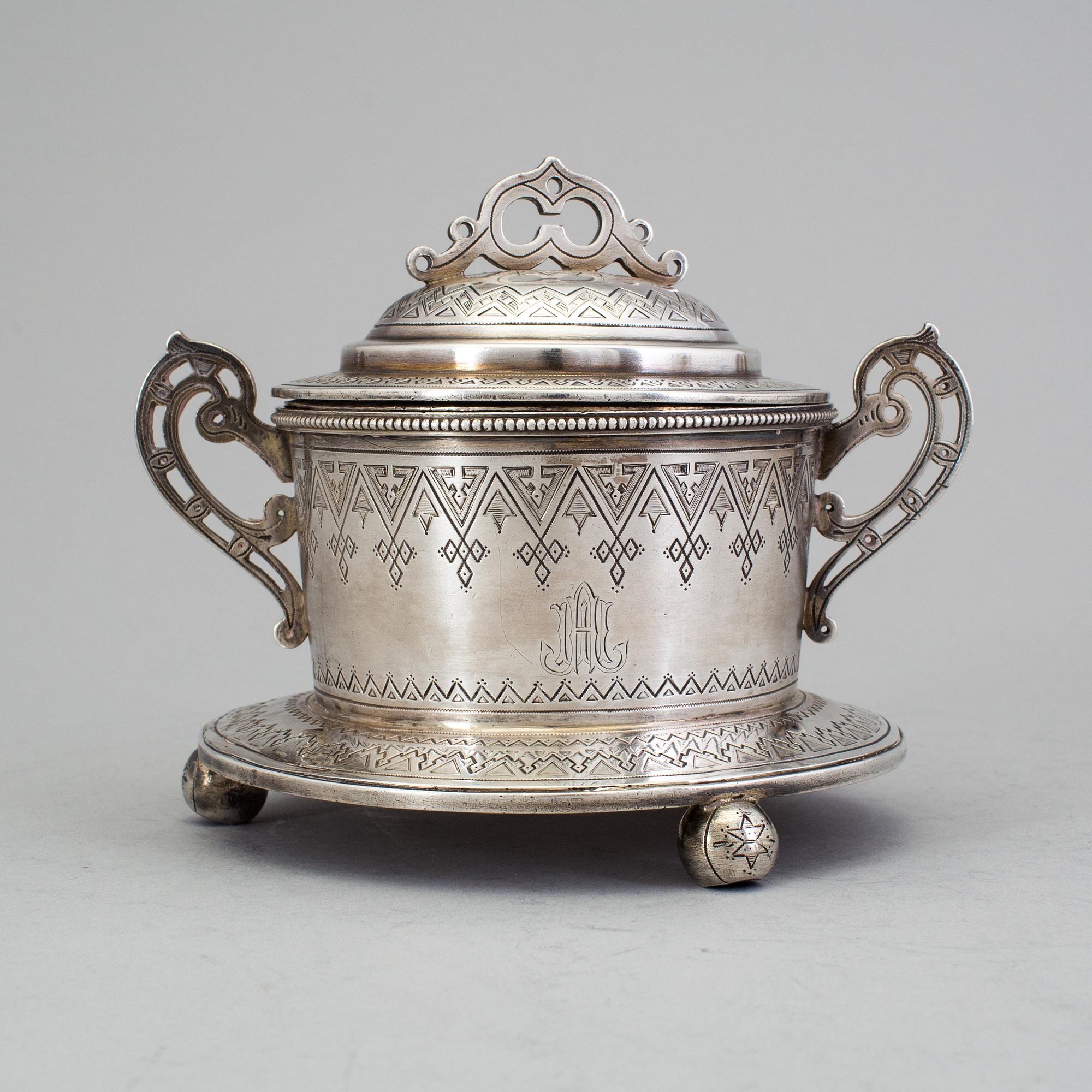 A Russian 19th century parcel-gilt sugar-casket, unidentified makers mark, St. Petersburg 1877.
