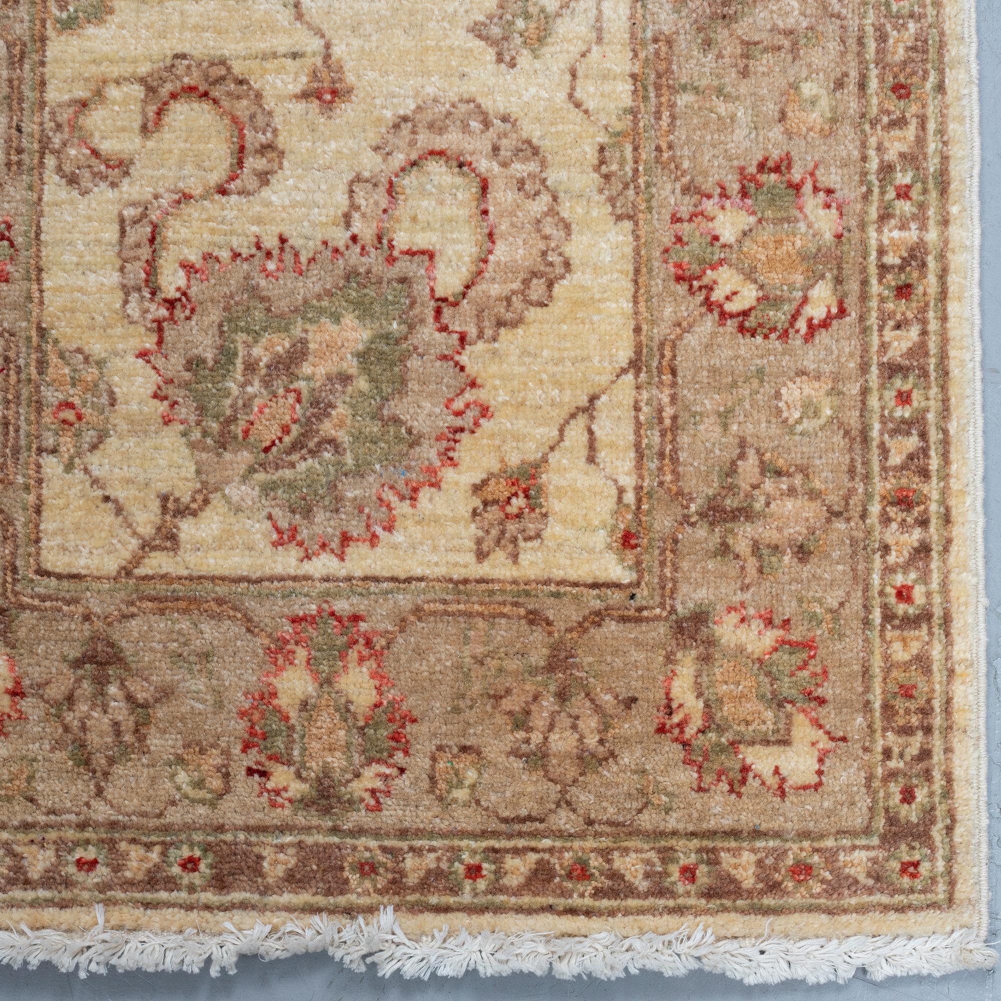 Two Zeigler design rugs, ca 84 x 61 cm.