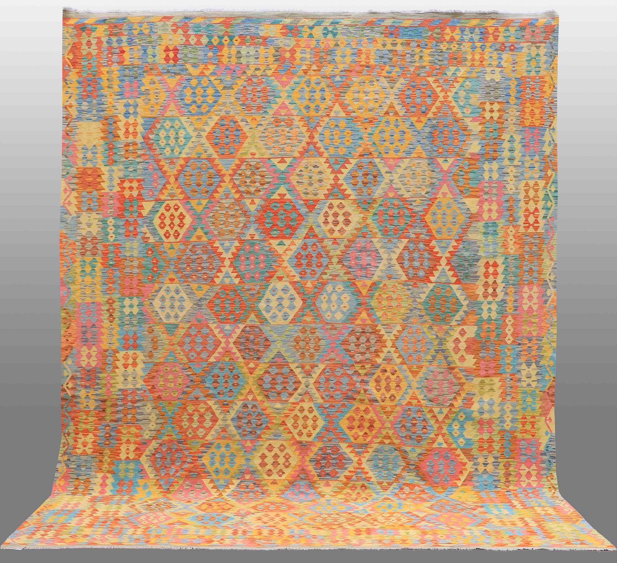 An oriental kilim, around 385 x 303 cm.