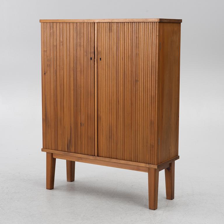 Swedish Modern, a pine cabinet, mid-20th century.