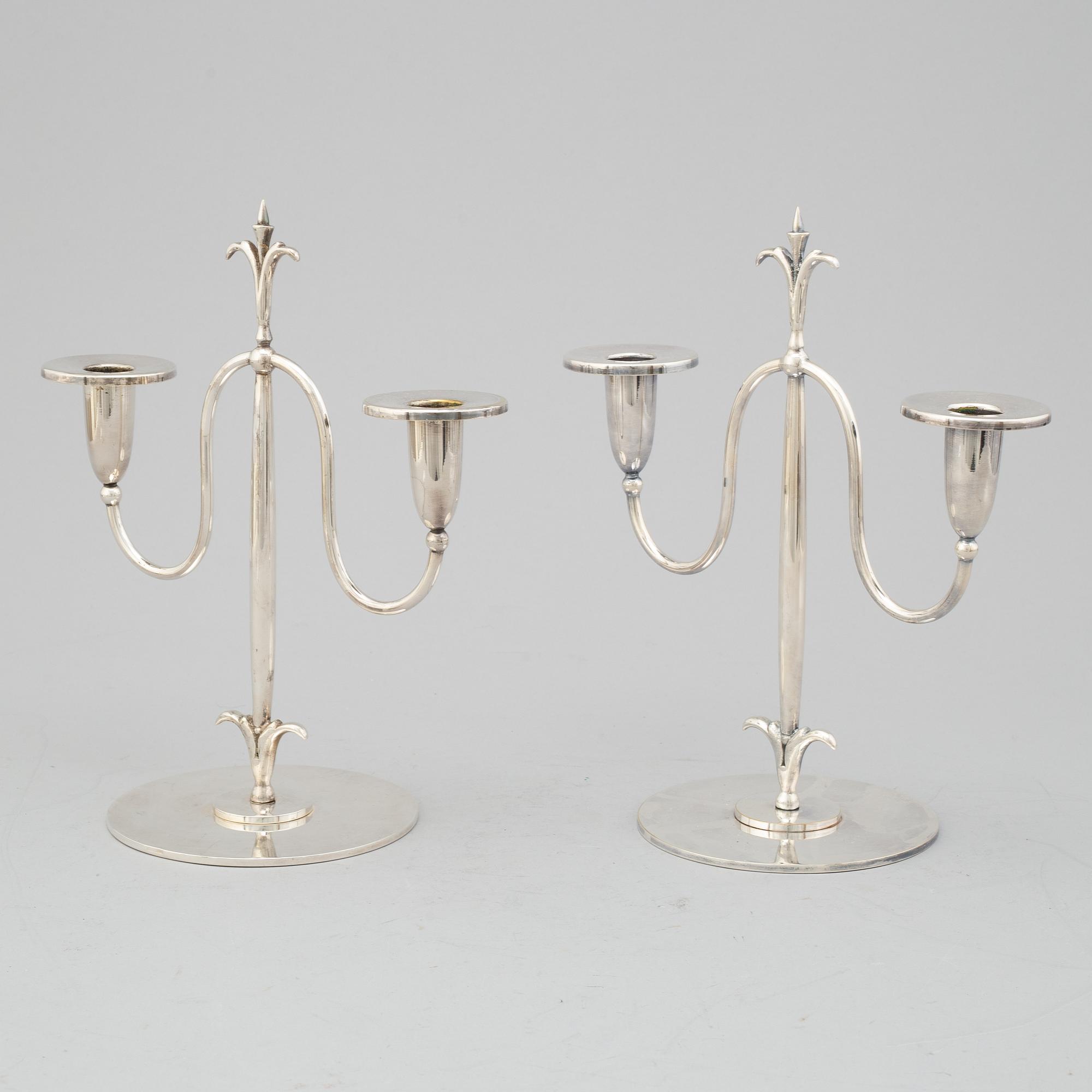 a pair of Elis Bergh silver plated candelabras, Swedish grace, CG Hallberg, Stockholm, 1920s.