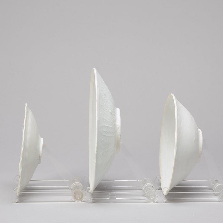 A group of three white glazed dishes, South East Asia, presumably 13th/15th Century.