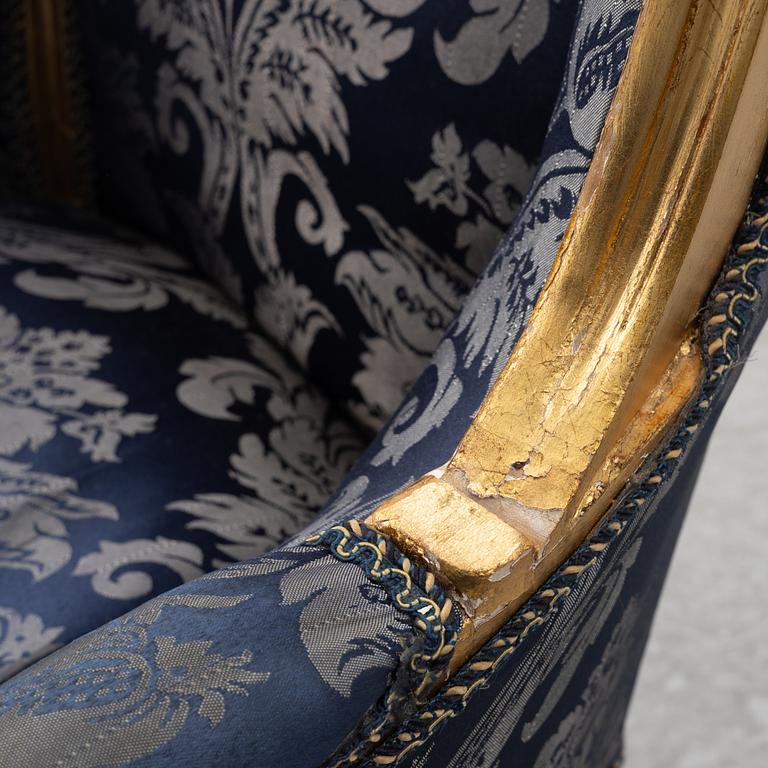 A pair of Louis XVI style armchairs, late 20th Century.