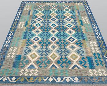 A Kilim rug, approx. 251 x 168 cm.