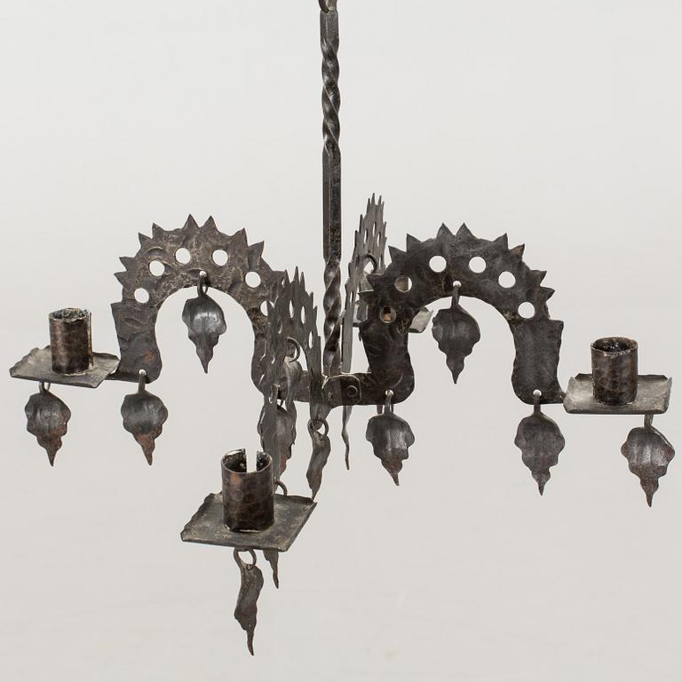 A FOLKLORE LAMP 20TH CENTURY.