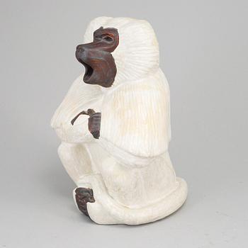 GUNNAR NYLUND, a stoneware sculpture of a monkey, Rörstrand mid 20th century.