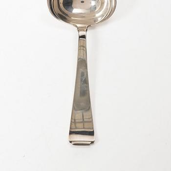Gustaf Möllenborg, a silver bowl, Stockholm 1851, six silver punch cups, including CG Hallberg, and a silver spoon.