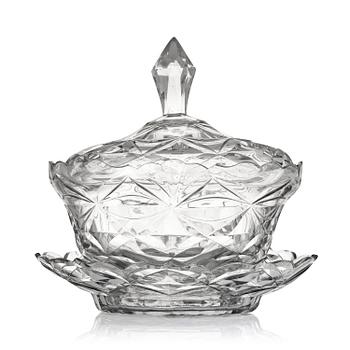 124. An Anglo-Irish cut glass jar with cover and stand, circa 1800.