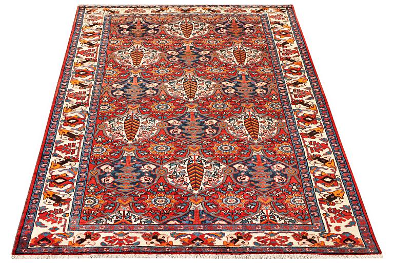A Hamadan carpet, c. 335 x 184 cm.