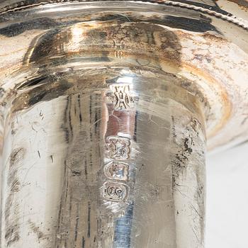 A pair of English silver candlesticks, mark of William Hutton & Sons Ltd, London 1902.